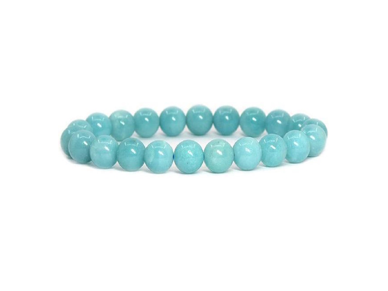 Magnifique Bracelet en Amazonite bleue. White Alpina vous propose la possibilité de lier d'autres charms en Argent 925. Bracelet avec perles 6mm.