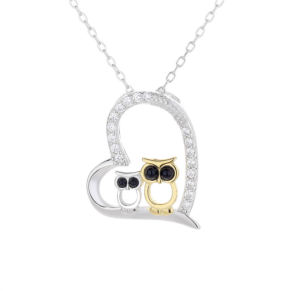 Pendentif Cœur Hibou en argent 925 brillant et doré avec des zircons transparents by White Alpina. Livré dans un écrin avec une chaîne