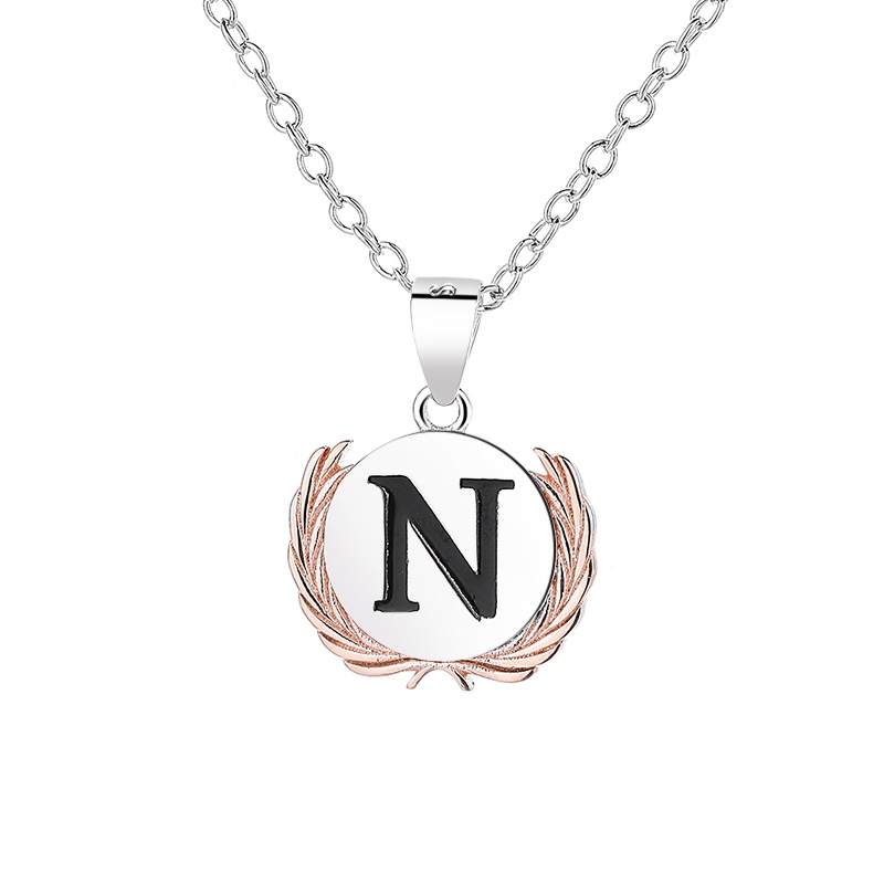 Pendentif Napoléon en argent 925 brillant by White Alpina. Avec couronne en argent rosé. Notre collier est livré avec chaine et écrin. Osez l'Histoire