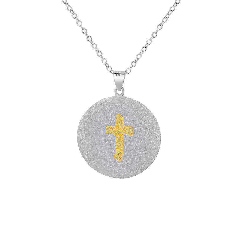 Pendentif Croix Always en argent 925 by White Alpina.  Ce magnifique collier Croix Always est livré dans un écrin avec une chaîne. Le médaillon mesure 2.5 cm de diamètre et est en argent 925 mat patiné. La croix 1.45 cm de haut et 0.9 cm de large et en argent 925 doré gravé. Le médaillon pèse sans la chaîne 4.58 gr. 